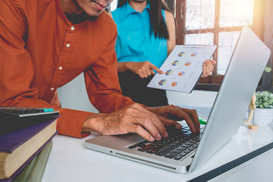 How to forecast with Accounts Receivable metrics , Business meeting time. Photo young account managers crew working with new startup project. Notebook on wood table. Idea presentation, analyze plans.